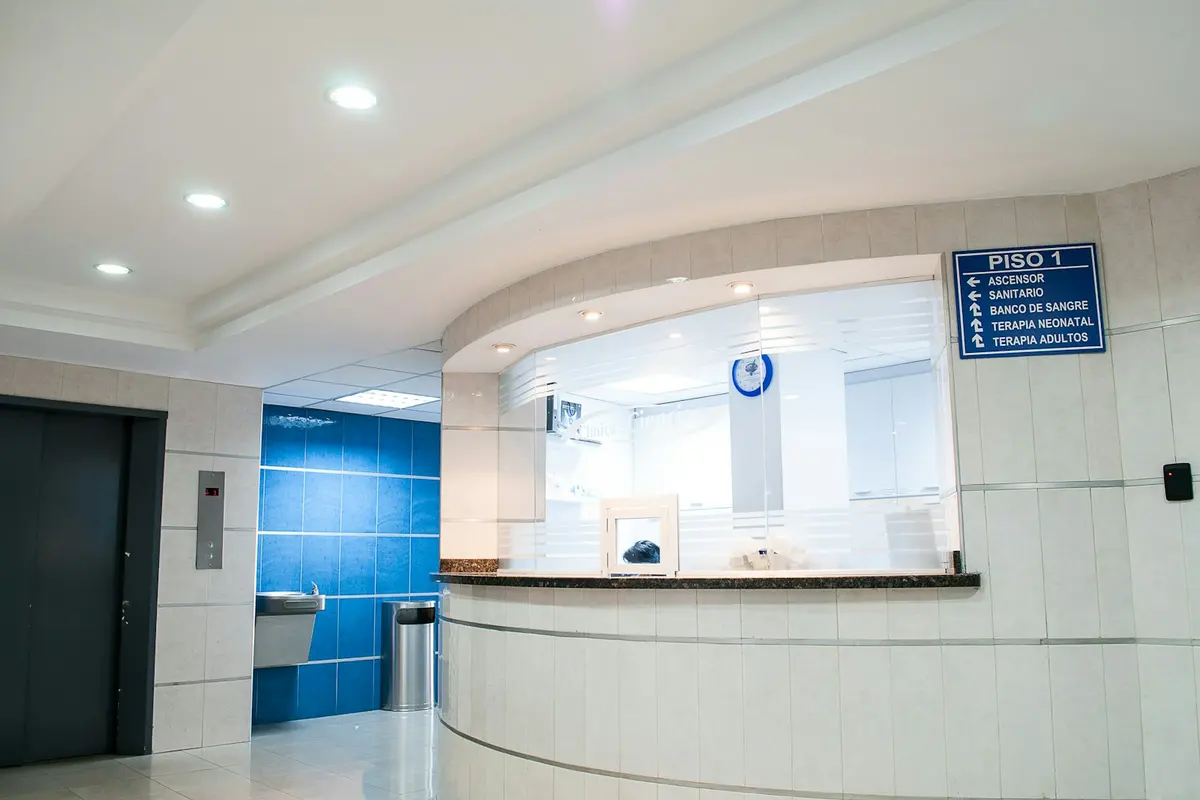 A clinic reception desk where new patients check in